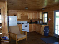 Log Cabin Rental - Living Room and Kitchen - Maine Whitewater