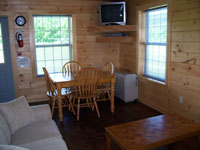 Log Cabin Rental - Living Room and Kitchen - Maine Whitewater