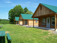 Log Cabin Rental Photos - Downstairs Bedroom - Maine Whitewater